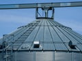 Details of modern granary elevator. Silver silos Royalty Free Stock Photo