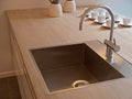 Details of modern kitchen sink with tap faucet Royalty Free Stock Photo