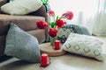 Details of modern living room interior. Tatami straw cushion decorated with flowers and pillow on the floor Royalty Free Stock Photo