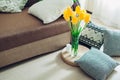 Details of modern living room interior. Tatami straw cushion decorated with flowers and pillow on the floor Royalty Free Stock Photo