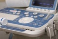 Details of a modern ultrasound machine inside a medic office