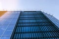 Details of office building exterior. Business buildings skyline looking up with blue sky. Modern architecture apartment. High tech Royalty Free Stock Photo