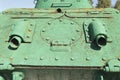 Details of the old Soviet tank. Military green camouflage metal background Royalty Free Stock Photo