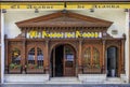 Details of an ornate carved wooden facade at a restaurant in the center of Madrid, Spain