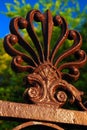 Details of an ornate wrought iron gate