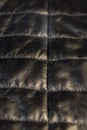 details and part of the jacket made of artificial leather in black