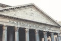 Details of a pediment and large granite Corinthian columns of the Pantheon, ancient Roman temple in Rome, Italy