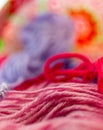 Details pink and red balls wool in wicker basket Royalty Free Stock Photo