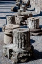 Details of remains of columns at the house of the faun in Pompeii Italy. Pompeii was destroyed and buried with ash and pumice aft Royalty Free Stock Photo