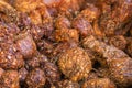 Details of ripe sour brown tamarind pile peeled tamarind seeds