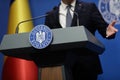 Details with the Romanian Government logo during a press conference held by a minister or politician