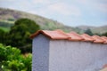 Details of the roofs on the wall of the house Royalty Free Stock Photo