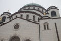 Details of Saint Sava temple Hram Svetog Save, in Serbian, windows and cupola with golden cross on top Royalty Free Stock Photo