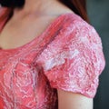 Details of a seamless dress made of merino wool pink hand-made Royalty Free Stock Photo