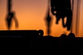 Details and silhouettes of an old sailing ship at sunset