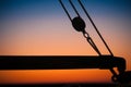 Details and silhouettes of an old sailing ship at sunset