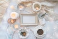 Details of still life in the home interior. Aroma stick, interior items, candles, frame for text, Moody. Cosy autumn winter light Royalty Free Stock Photo