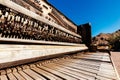 Details of strings and keys Inside of a broken wooden piano, in Arizona Royalty Free Stock Photo