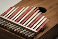 Thumb piano Kalimba, Mbira with silver and red tines