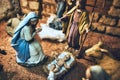 Details of a traditional Christmas nativity crib scene with painted figurines Royalty Free Stock Photo