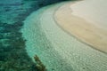 details of tropical beach with shades of water and coral Royalty Free Stock Photo