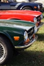 Details of vintage British cars, fender, wheel, and tires