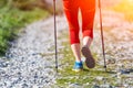 Details of walking on mountain road with sticks