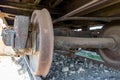 Closeup of the old rusty train wheels. Details of the wheel of train. Royalty Free Stock Photo