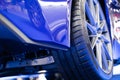 Details about the wheels of a blue super sports car, luxury car Royalty Free Stock Photo