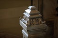 Details with a white marble stairs pillar in an old building in Bucharest built in the late XIX century french architectural style Royalty Free Stock Photo