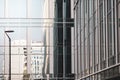 Details with the windows and glass walls and reflections in them of an office/business modern building Royalty Free Stock Photo