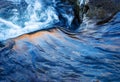 Details winter river ripples in blue tint