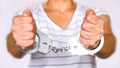 Detained woman at the police station. Handcuffs on the wrists of the detainee Royalty Free Stock Photo