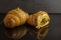 Detail of an open pistachio croissant Royalty Free Stock Photo