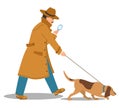 Detective holding magnifying glass follows trail with dog Royalty Free Stock Photo