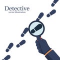 Detective is investigating. Human in gloves holds a magnifying g