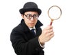 Detective with magnifying glass isolated on the