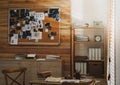 Detective office interior with evidence board on wall Royalty Free Stock Photo