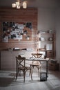 Detective office interior with evidence board on wall Royalty Free Stock Photo