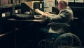 Detective wheelchair user gather criminal case clues from archived documents