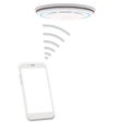 Detector alarm wifi connect with smartphone on white Royalty Free Stock Photo