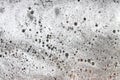 Detergent bubbles float in the waste water Royalty Free Stock Photo