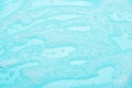 Detergent foam, shampoo, soap bubbles on blue background Royalty Free Stock Photo