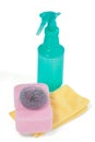 Detergent spray bottle, scrubber, sponge pad and napkin cloth on white background Royalty Free Stock Photo