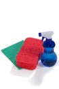 Detergent spray bottle, sponge pad and wipe pad on white background Royalty Free Stock Photo