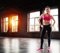 Determinated girl at the gym ready to start fitness lesson Royalty Free Stock Photo