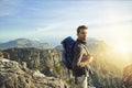 Determination got him to the top. a young man hiking up a mountain. Royalty Free Stock Photo