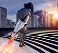 Determination and power businessman that holds a rocket. Startup concept Royalty Free Stock Photo