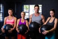 Determined athletes with fitness ball Royalty Free Stock Photo