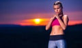 Determined Athletic Fitness Woman in Tae Bo Fighting Stance